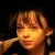 six pixelated images showing a person with brown hair and bangs, each containing text fragments forming 'Charlie, come out where ever you are' against dark backgrounds