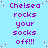 Light blue background with repeated purple text "Chelsea rocks your socks off!!!" and scattered red dots, no visible animation changes.