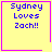 Yellow square with purple border displaying blue text "Sydney Loves Zach!!" and a small purple heart or star in the bottom-right corner.