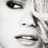 Static grayscale close-up of a person's face with visible eyes, nose, and mouth features in pixelated style.