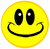 Static pixelated yellow smiley face icon with black oval eyes and a wide curved mouth, rendered in low-resolution 8-bit style on white background.
