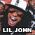 Pixelated static image of a person with dark hair wearing a black shirt, featuring bold white text "UL JOHN" at the bottom against a dark background.