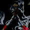 Animated sequence of a character with blue hair and red accents performing dynamic poses against black background, transitioning to orange flame-like patterns.