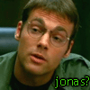 A four- shows a person in a green shirt with changing facial expressions and green pixelated text overlays