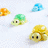 Pixelated turtle icons in green, yellow, and orange on white background with red text overlays reading 'Were cute', 'were cuddly', and 'Were turtles and we rock'.