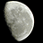 Pixelated moon graphic on black background with blue text elements on dark red background.