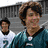 A composite image showing two distinct scenes: a person in a teal sports jersey and another wearing a Santa hat, with grayscale background elements.