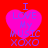 A red background with four identical pink heart shapes, each containing blue text reading "I LOVE MY MUSIC XOXO".