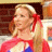 A 48x48 pixel animated buddy icon featuring a blonde woman in a red and blue outfit with a red bow, alongside green text reading "Original Icons .com" on a dark background.