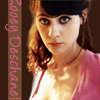 A static image of a person with light brown hair wearing a pink top and black choker necklace, with vertical pink text on the left side.