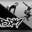 Black-and-white pixelated icon featuring two stick figures in dynamic poses with large Chinese characters at the bottom, set against a gradient background.