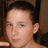 A pixelated image divided into four quadrants with a person in the top-left, yellow text on black backgrounds in top-right and bottom-left, and a gray square in bottom-right.