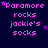 identical pixelated text icons on a dark blue background, each displaying 'Paramore rocks jackie's socks' in bright pink with small purple stars scattered around