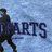 Animated scene with two silhouetted figures against a blue pixelated background, one figure holding a camera-like object aimed at the other.