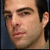 A four- shows a person's face with subtle expression changes , set against a blue background