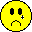 Yellow circular face with black eyes and mouth; expression shifts from sad to smiling across frames, some faces have small gray marks near cheeks.