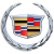 A pixelated emblem featuring a shield with red, black, blue, and gold sections, encircled by a silver ring on a gray background.