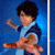 Four distinct pixelated images arranged in a : top-left shows a child with dark hair and blue-and-white shirt, top-right features an adult male in light purple polo shirt, bottom-left depicts two men including one in police uniform, bottom-right displays text "These boys are my Hell"