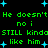 Green pixelated text repeats 'He doesn't no i STILL kinda like him' with blue starbursts on black background, animated by shifting positions.