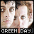 Pixelated static image of two male faces with text "GREEN DAY" at the bottom, likely representing a band logo or promotional icon.