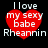 Red heart-shaped icon with white text reading "I love my sexy babe Rheannin" on black background, displayed in four identical positions