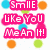 Pixelated pink text phrases on white background with scattered colored circles and hearts, including "Smile Like You Mean It!", "Live Laugh Love", and "HAHA Wait... What?".