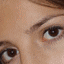 A 2x2 contact sheet of a four-frame animation showing close-up facial features with text "love me" in the bottom-left frame.