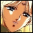 Pixelated anime-style close-up of a character with blonde hair and blue eyes, next to stylized text on a black background.