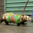 A 48x48 pixel animated buddy icon featuring a ferret-like animal in motion, paired with red text reading "Along Came Polly" on the right side of a contact sheet layout.