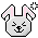 Pixel art bunny head with pink inner ears, black outline, and gray background; left view shows closed eyes with winking expression, right view shows open eyes.