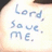 Pixelated text reads 'Lord, save me.' on a light background with blurred edges.
