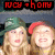 Two pixelated figures with light hair wear green and red headbands under a digital clock display showing '10:08' in red numerals on black background.