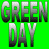 Green background with large gray text reading 'GREEN DAY' above a pixelated figure holding a guitar.