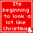Red square icon with white pixelated text reading "Its beginning to look a lot like Christmas" and small snowflake symbols at bottom right corner.