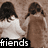 Animated sequence showing two figures from behind with long dark hair, wearing white and brown tops, transitioning between 'friends' and 'boyfriends' text overlays.
