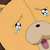 Animated orange cartoon character with black eyes, pink tongue, and white-and-black checkered nose drops from top to bottom.