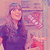 Pixelated image of a person with long dark hair wearing a dark top, holding a pink and white object against a soft pastel background.