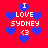 Red background with blue heart shapes and white text reading "I LOVE SYDNEY <3" arranged in a repeating pattern.