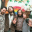 Group of people standing together with a rainbow flag, text "Vetiver" and "To Find Me Gone" on black