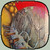 Pixelated circular icon with gradient background transitioning from red at top to yellow on left, featuring indistinct dark shapes and light areas in the center.
