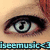 A close-up of a person's eye with a musical note symbol in the iris, showing subtle animation changes between frames.