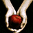 Animated sequence showing hands holding a red apple and two figures in front of a vehicle with changing poses.
