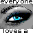 Pixelated eyes with blue irises and black pupils, framed by dark eyelashes on a gray background, with text above and below.