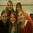Group of people in a pixelated photo next to large gradient-colored letters BFL on black background.