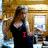 A woman in a black tank top stands in a wooden room with windows, her pose shifting across frames as red text changes from 'I' to 'LOVE' to 'ALEC JORDAN'.