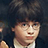 Pixelated image of a person with dark hair and glasses, next to light green text reading 'Our new celebrity.' on dark background.