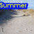 A beach scene with sand dunes and ocean background displays changing text overlays: 'Summer' at top-left, '!BLASTIN!' in yellow-red at bottom-right, and ''08' at bottom-center.