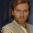 Static pixelated image of a person with light brown hair and beard wearing a beige tunic against dark blue background.