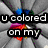 A pixelated animation with a gray geometric background and colorful radial shapes, displaying text fragments that form "u colored on my heart and... it will not erase"