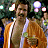 A 48x48 pixel animated buddy icon featuring a character in an orange suit with a white undershirt, holding a guitar-like object against a blue background with text and light effects.